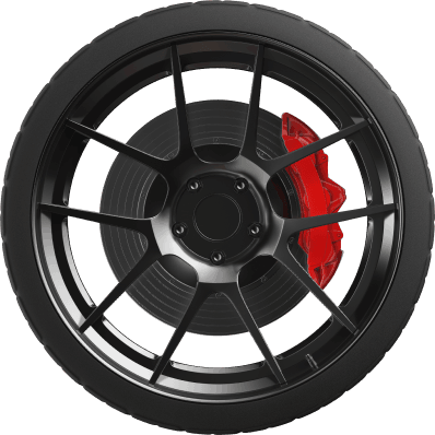 Close-up of a matte black multi-spoke alloy wheel with a high-performance red brake caliper and ventilated disc rotor.