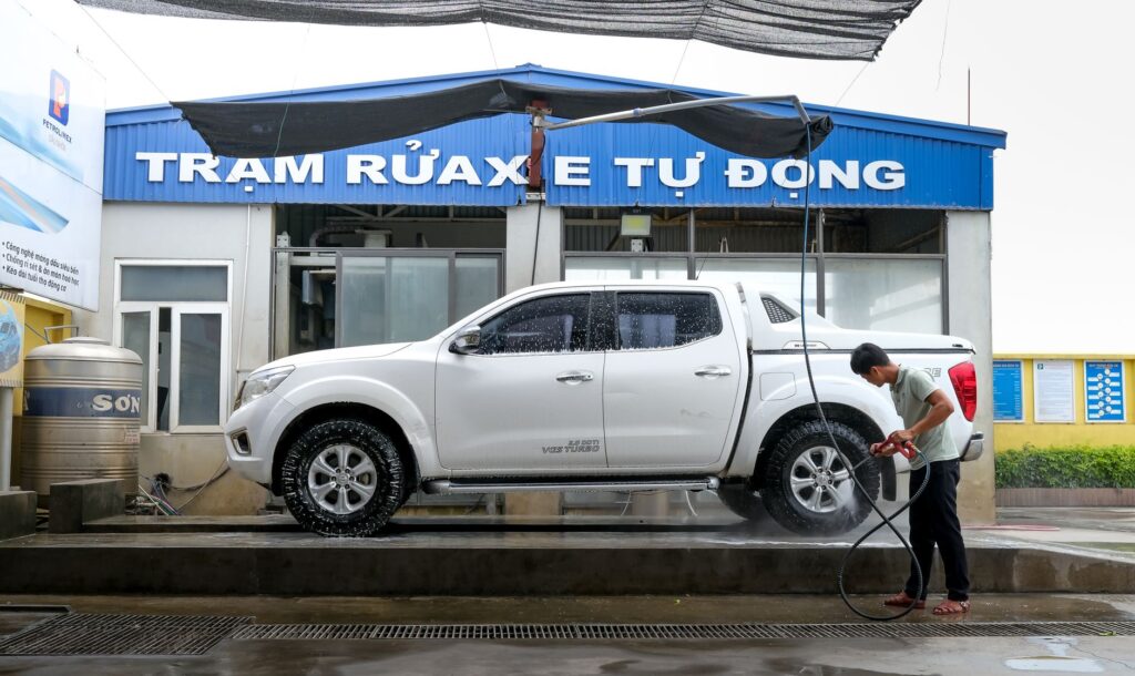 truck detailing near me technician cleaning pickup interior in Ocala