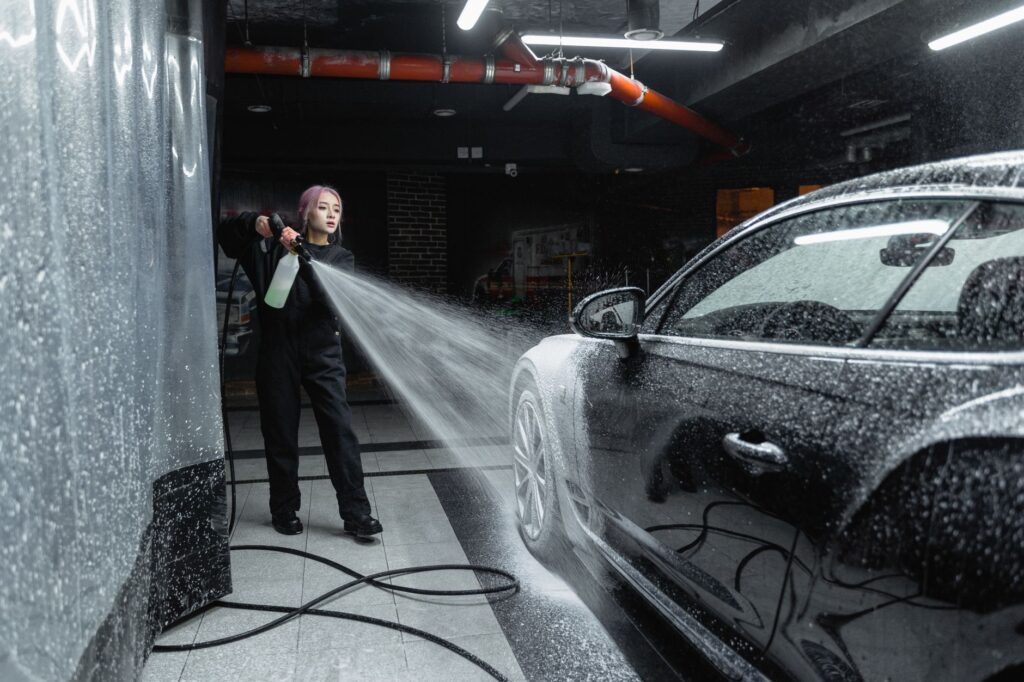 technician performing maintenance wash on a coated RV in Ocala FL