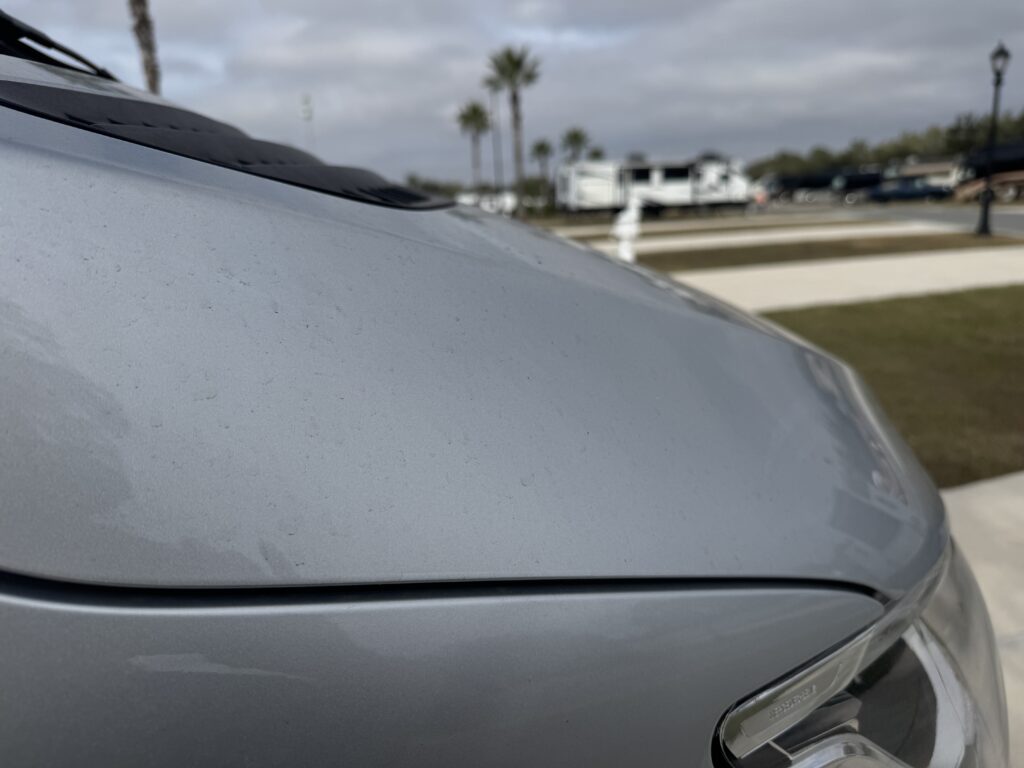 before and after paint correction results from luxury auto detailing
