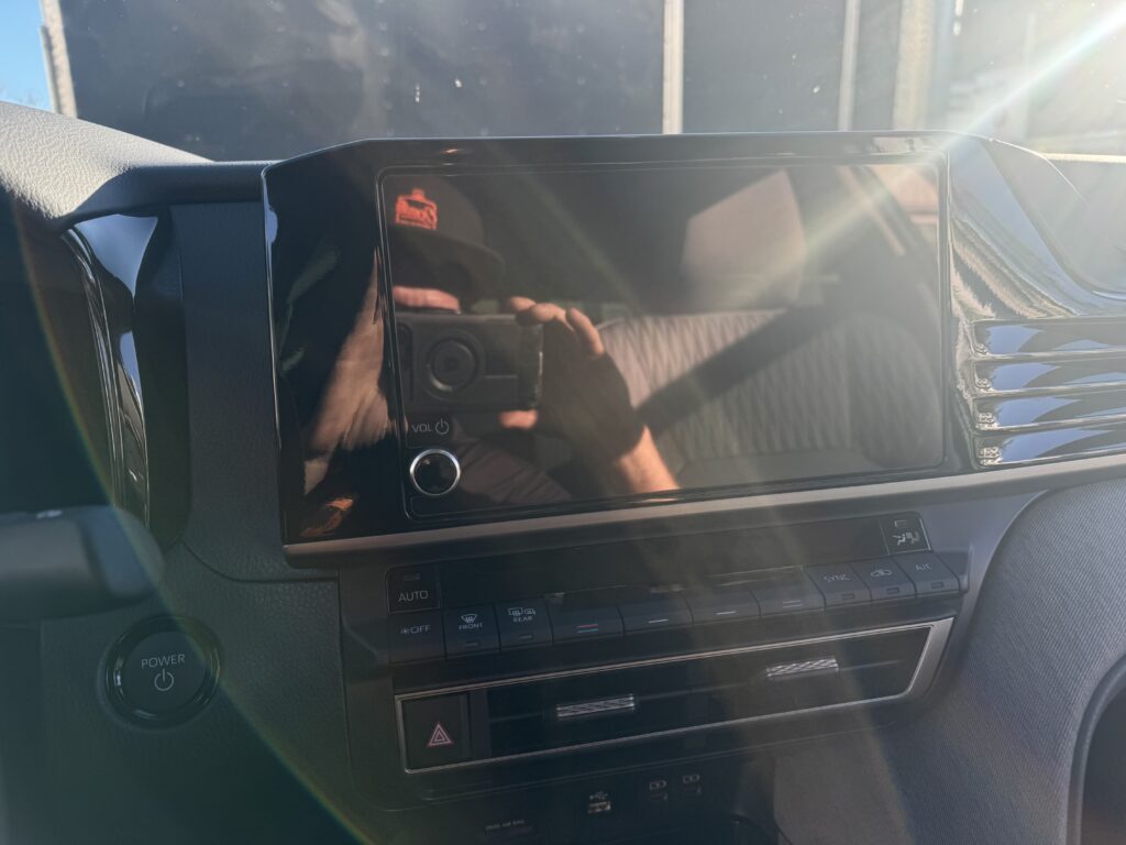 comparison of a dull vs freshly detailed car hood after professional car detailing