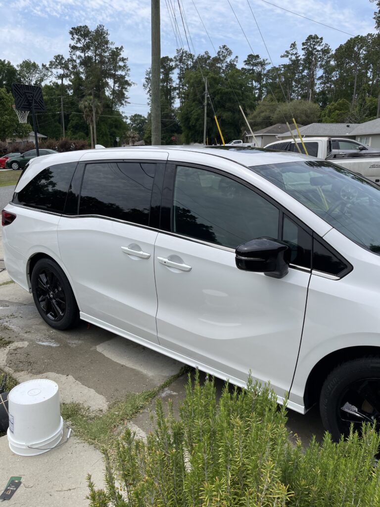 RV Wash Near Me Do It Yourself: A Practical Ocala Owner's Guide 1 homeowner performing an rv wash near me do it yourself project in a driveway with hose and brush