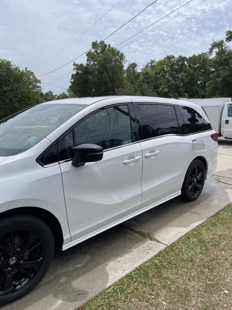 Car Detailers Near Me Mobile: What Ocala Drivers Need in 2026 1 mobile car detailers near me setting up equipment in an Ocala driveway