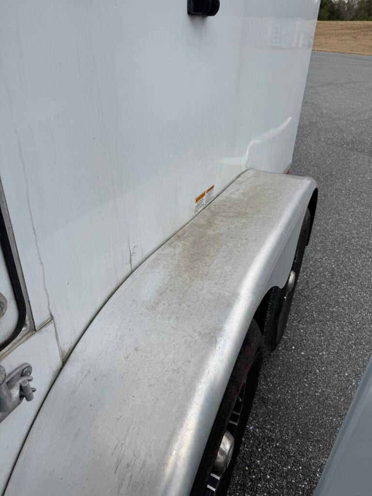 mobile detailing van parked beside a fifth wheel trailer in Marion County