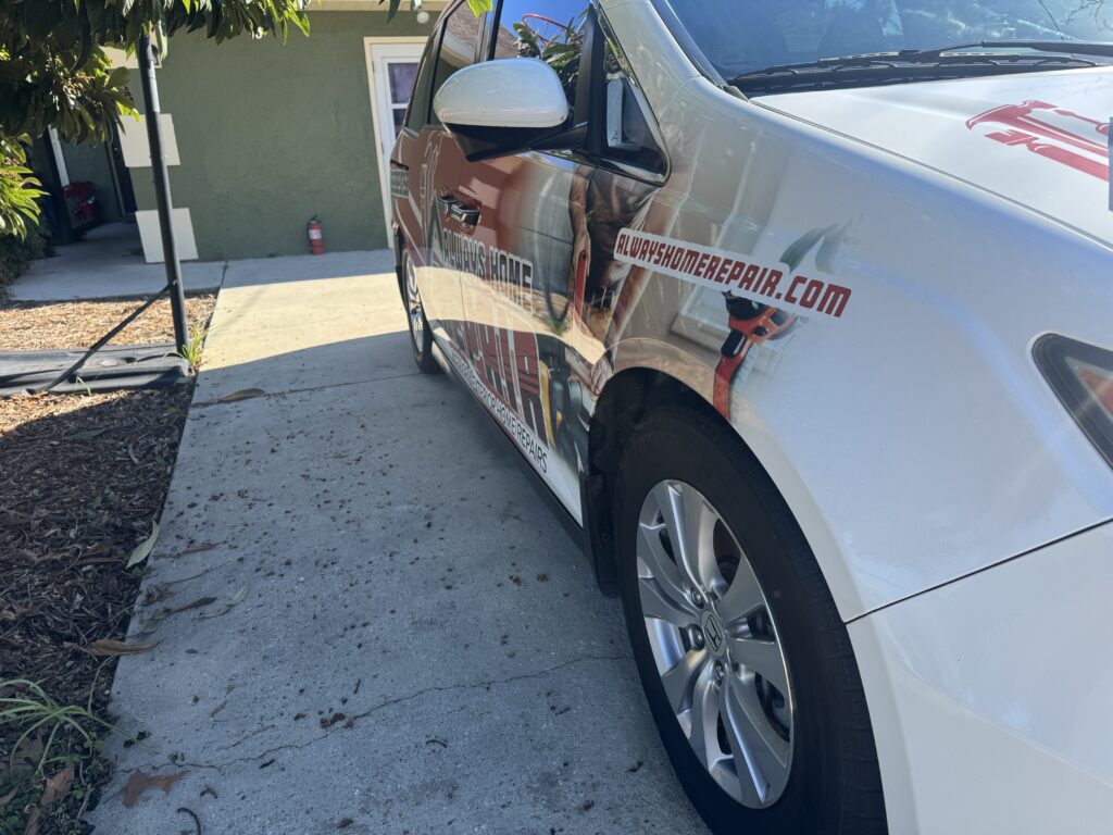 mobile fleet detailing crew cleaning company work trucks in an Ocala parking lot